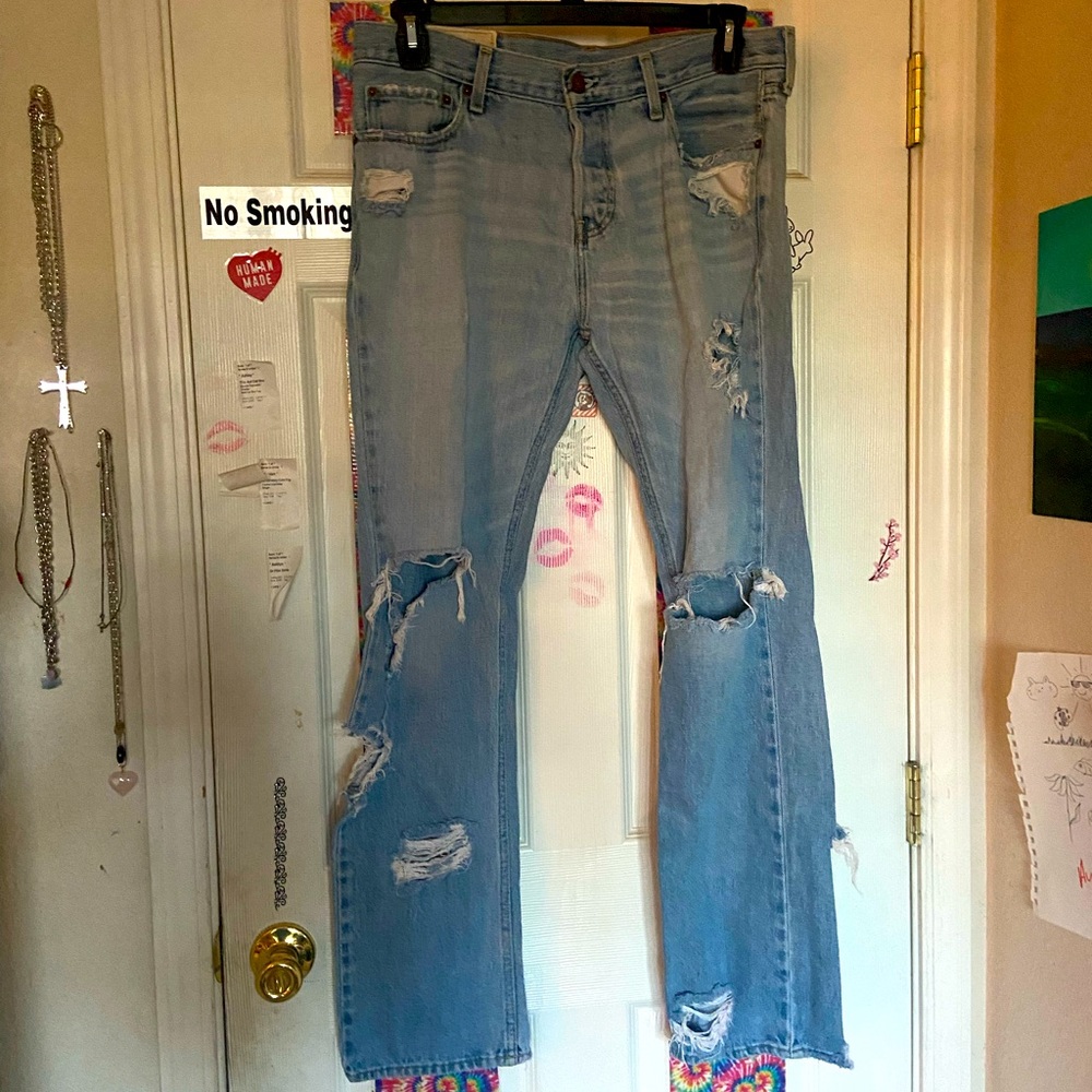 The Hollister Slim Steaight light wash ripped jeans